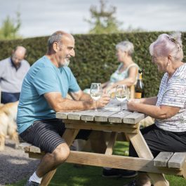 Adults enjoying an adults-only caravan holiday at a Tranquil Parks site